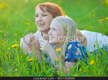 To use this stock image in your creative project, please select the size you need over to the right and click the "Add to Cart" button.
Your downloaded image will come with the Cutcaster watermark removed so don’t worry about the watermark you see on this page. Mom with braces and her little daughter lie on grass smiling at the park stock photo, Portrait of smiling beautiful young woman and her little daughter sitting on grass, against green of summer park. by traza