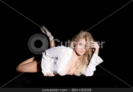 To use this stock image in your creative project, please select the size you need over to the right and click the "Add to Cart" button.
Your downloaded image will come with the Cutcaster watermark removed so don’t worry about the watermark you see on this page. pretty blonde in open shirt stock photo, pretty blonde in open shirt on black background by sijohnsen