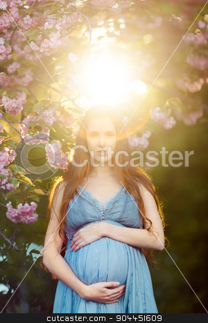 To use this stock image in your creative project, please select the size you need over to the right and click the "Add to Cart" button.
Your downloaded image will come with the Cutcaster watermark removed so don’t worry about the watermark you see on this page. Young pregnant woman relaxing and enjoying life in nature stock photo, Young beautiful pregnant girl. Beams of the sunset by Dmytro Buianskyi