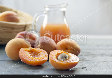 To use this stock image in your creative project, please select the size you need over to the right and click the "Add to Cart" button.
Your downloaded image will come with the Cutcaster watermark removed so don’t worry about the watermark you see on this page. Fresh apricots and juice on light gray wood, copy space in the b stock photo, Fresh apricots and juice on light gray wood, copy space in the blurry background, selected focus, narrow depth of field by Maren Winter