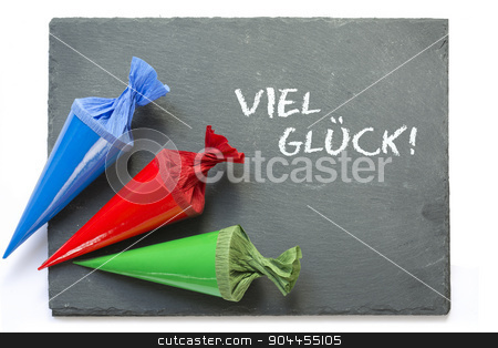 To use this stock image in your creative project, please select the size you need over to the right and click the "Add to Cart" button.
Your downloaded image will come with the Cutcaster watermark removed so don’t worry about the watermark you see on this page. school cones on a blackboard with message good luck stock photo, three colurful school cones on a blank blackboard, german words viel glueck, that means good luck, isolated on a white background
by Maren Winter