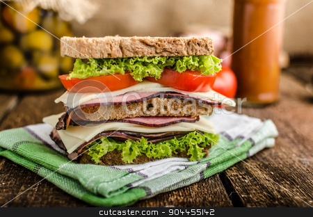To use this stock image in your creative project, please select the size you need over to the right and click the "Add to Cart" button.
Your downloaded image will come with the Cutcaster watermark removed so don’t worry about the watermark you see on this page. Smoked meat sandwich stock photo, Sandwich with fresh smoked meat, cheese, lettuce and tomato with homemade ketchup by Peteer