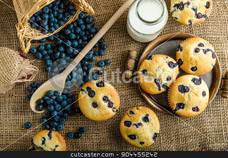 To use this stock image in your creative project, please select the size you need over to the right and click the "Add to Cart" button.
Your downloaded image will come with the Cutcaster watermark removed so don’t worry about the watermark you see on this page. Blueberry muffins stock photo, Blueberry muffins milk and jam in background and basket full of blueberries by Peteer