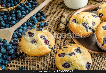 To use this stock image in your creative project, please select the size you need over to the right and click the "Add to Cart" button.
Your downloaded image will come with the Cutcaster watermark removed so don’t worry about the watermark you see on this page. Blueberry muffins stock photo, Blueberry muffins milk and jam in background and basket full of blueberries by Peteer
