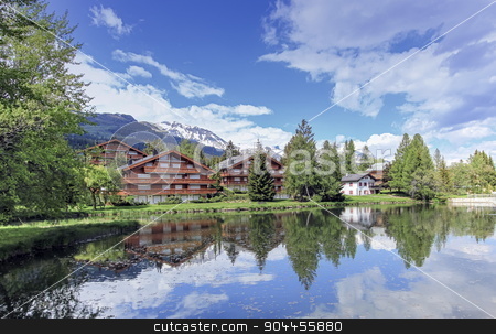 To use this stock image in your creative project, please select the size you need over to the right and click the "Add to Cart" button.
Your downloaded image will come with the Cutcaster watermark removed so don’t worry about the watermark you see on this page. Crans-Montana, Valais, Switzerland stock photo, Chalets and lake at Crans-Montana by beautiful day, Valais, Switzerland by Elenarts