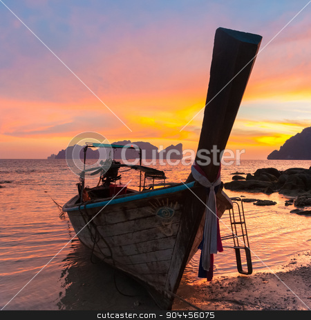 To use this stock image in your creative project, please select the size you need over to the right and click the "Add to Cart" button.
Your downloaded image will come with the Cutcaster watermark removed so don’t worry about the watermark you see on this page. Traditional wooden longtail boat on beach in sunset, Thailand. stock photo, Traditional thai wooden longtail boat on beach of Phi-Phi Don island in sunset. Silhouette of famous Phi Phi Lee island in background. Thailand, Krabi province. by kasto