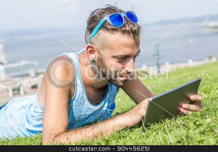 To use this stock image in your creative project, please select the size you need over to the right and click the "Add to Cart" button.
Your downloaded image will come with the Cutcaster watermark removed so don’t worry about the watermark you see on this page. Hipster men stock photo, A Hipster men on the street on a city by Louis-Paul St-Onge