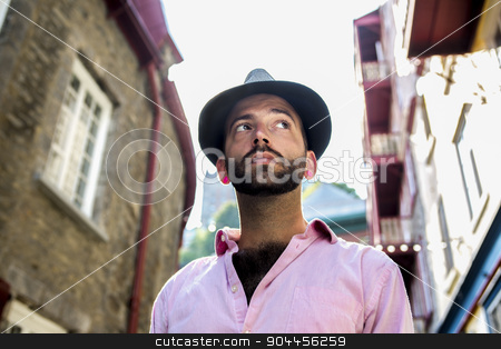 To use this stock image in your creative project, please select the size you need over to the right and click the "Add to Cart" button.
Your downloaded image will come with the Cutcaster watermark removed so don’t worry about the watermark you see on this page. Hipster men stock photo, A Hipster men on the street on a city by Louis-Paul St-Onge