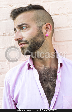 To use this stock image in your creative project, please select the size you need over to the right and click the "Add to Cart" button.
Your downloaded image will come with the Cutcaster watermark removed so don’t worry about the watermark you see on this page. Hipster men stock photo, A Hipster men on the street on a city by Louis-Paul St-Onge