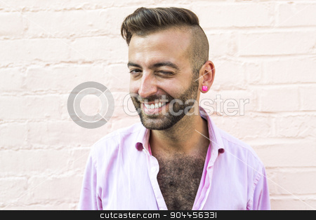 To use this stock image in your creative project, please select the size you need over to the right and click the "Add to Cart" button.
Your downloaded image will come with the Cutcaster watermark removed so don’t worry about the watermark you see on this page. Hipster men stock photo, A Hipster men on the street on a city by Louis-Paul St-Onge