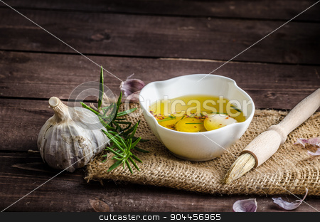To use this stock image in your creative project, please select the size you need over to the right and click the "Add to Cart" button.
Your downloaded image will come with the Cutcaster watermark removed so don’t worry about the watermark you see on this page. Seasoned olive oil, garlic and rosemary stock photo, Seasoned olive oil, garlic and rosemary, place for text advertisment by Peteer