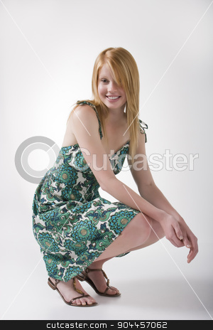 To use this stock image in your creative project, please select the size you need over to the right and click the "Add to Cart" button.
Your downloaded image will come with the Cutcaster watermark removed so don’t worry about the watermark you see on this page. Cute model in green dress stock photo, Cute model posing in green print summer dress in a studio by JRstock