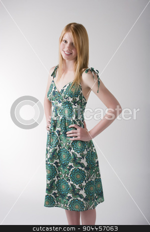 To use this stock image in your creative project, please select the size you need over to the right and click the "Add to Cart" button.
Your downloaded image will come with the Cutcaster watermark removed so don’t worry about the watermark you see on this page. Redhead model in green dress stock photo, Redhead model posing in a green pring dress in a studio by JRstock