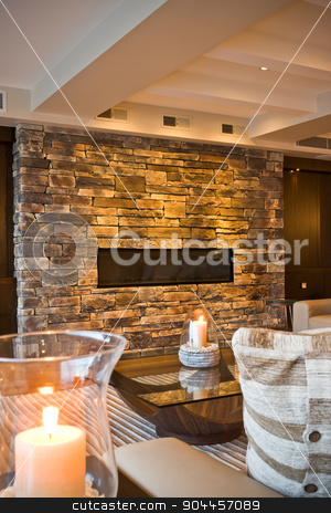 To use this stock image in your creative project, please select the size you need over to the right and click the "Add to Cart" button.
Your downloaded image will come with the Cutcaster watermark removed so don’t worry about the watermark you see on this page. A detail of a cozy living room stock photo, Burning decorative candles in a cozy living room by JRstock