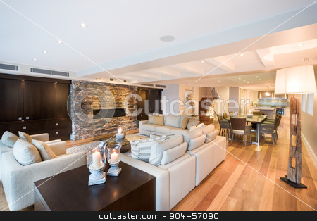 To use this stock image in your creative project, please select the size you need over to the right and click the "Add to Cart" button.
Your downloaded image will come with the Cutcaster watermark removed so don’t worry about the watermark you see on this page. Beautiful living room with wooden floor stock photo, Beautiful living room with three sofas and a luxurious wooden floor by JRstock