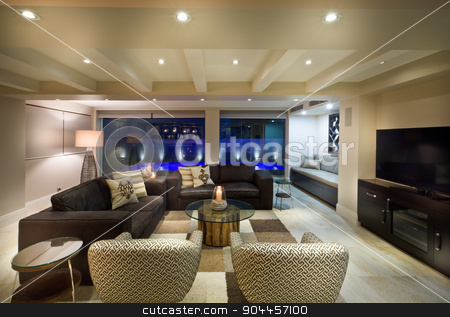 To use this stock image in your creative project, please select the size you need over to the right and click the "Add to Cart" button.
Your downloaded image will come with the Cutcaster watermark removed so don’t worry about the watermark you see on this page. Beautiful living room with a tv set stock photo, Beautiful living room with big windows, couple of sofas and armchairs and a tv set by JRstock