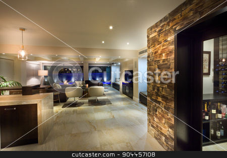 To use this stock image in your creative project, please select the size you need over to the right and click the "Add to Cart" button.
Your downloaded image will come with the Cutcaster watermark removed so don’t worry about the watermark you see on this page. Big living room with a wine cellar stock photo, Big living room with a wine cellar in a luxurious house by JRstock