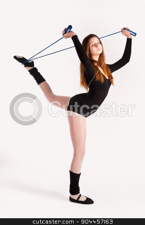 To use this stock image in your creative project, please select the size you need over to the right and click the "Add to Cart" button.
Your downloaded image will come with the Cutcaster watermark removed so don’t worry about the watermark you see on this page. fitness woman making balance exercise stock photo, Young cute woman in gymnast suit show athletic skill at white background by Aikon