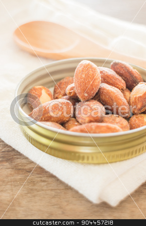 To use this stock image in your creative project, please select the size you need over to the right and click the "Add to Cart" button.
Your downloaded image will come with the Cutcaster watermark removed so don’t worry about the watermark you see on this page. Almond grain roast salt on weathered wooden table stock photo, Almond grain roast salt on weathered wooden table, stock photo by nalinratphi
