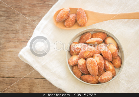 To use this stock image in your creative project, please select the size you need over to the right and click the "Add to Cart" button.
Your downloaded image will come with the Cutcaster watermark removed so don’t worry about the watermark you see on this page. Almond grain roast salt on weathered wooden table stock photo, Almond grain roast salt on weathered wooden table, stock photo by nalinratphi