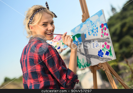 To use this stock image in your creative project, please select the size you need over to the right and click the "Add to Cart" button.
Your downloaded image will come with the Cutcaster watermark removed so don’t worry about the watermark you see on this page. Beautiful blonde woman artist paints a colorful picture. stock photo, Beautiful blonde woman artist in a playful mood dressed in a plaid shirt. She paints a picture with a brush and paints nature by bezikus
