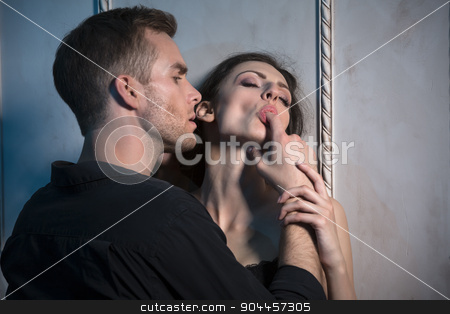 To use this stock image in your creative project, please select the size you need over to the right and click the "Add to Cart" button.
Your downloaded image will come with the Cutcaster watermark removed so don’t worry about the watermark you see on this page. Two lovers under the wall of a beautiful interior stock photo, Two lovers under the wall of a beautiful interior. She sucks a finger partner, holding his hand by bezikus