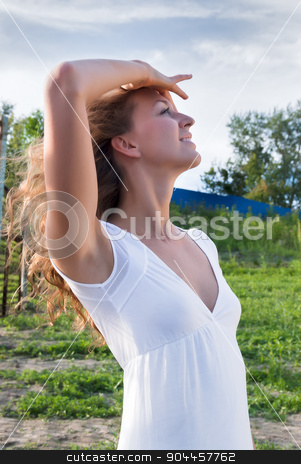 To use this stock image in your creative project, please select the size you need over to the right and click the "Add to Cart" button.
Your downloaded image will come with the Cutcaster watermark removed so don’t worry about the watermark you see on this page. Attractive young woman in white dress stock photo, Fashion style photo of beautiful woman over urban background by Aikon
