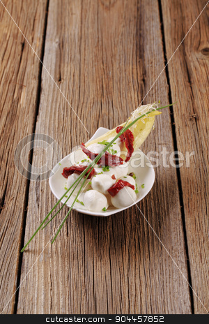 To use this stock image in your creative project, please select the size you need over to the right and click the "Add to Cart" button.
Your downloaded image will come with the Cutcaster watermark removed so don’t worry about the watermark you see on this page. Cheese appetizer stock photo, Small balls of mozzarella cheese and sun dried tomato by Digifoodstock