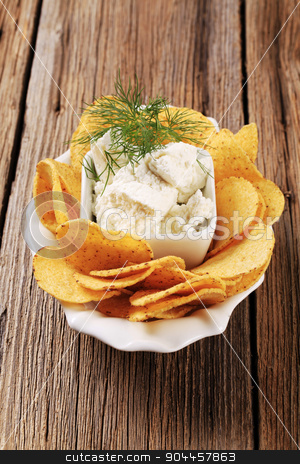 To use this stock image in your creative project, please select the size you need over to the right and click the "Add to Cart" button.
Your downloaded image will come with the Cutcaster watermark removed so don’t worry about the watermark you see on this page. Corn chips and fresh cheese stock photo, Bowl of corn chips and fresh cheese by Digifoodstock