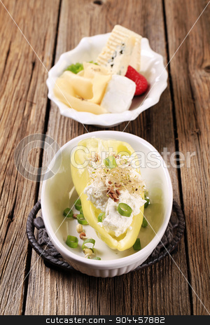 To use this stock image in your creative project, please select the size you need over to the right and click the "Add to Cart" button.
Your downloaded image will come with the Cutcaster watermark removed so don’t worry about the watermark you see on this page. Vegetarian appetizer stock photo, Pepper with curd cheese and lentil sprouts by Digifoodstock