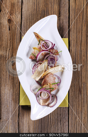 To use this stock image in your creative project, please select the size you need over to the right and click the "Add to Cart" button.
Your downloaded image will come with the Cutcaster watermark removed so don’t worry about the watermark you see on this page. Pan fried meat and vegetables stock photo, Pan fried meat with onion and endive leaves by Digifoodstock
