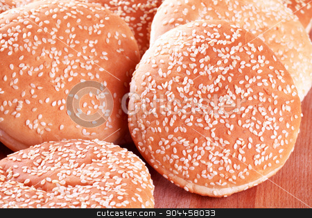 To use this stock image in your creative project, please select the size you need over to the right and click the "Add to Cart" button.
Your downloaded image will come with the Cutcaster watermark removed so don’t worry about the watermark you see on this page. Sesame seed buns stock photo, Hamburger bunswith sesame seeds on top by Digifoodstock