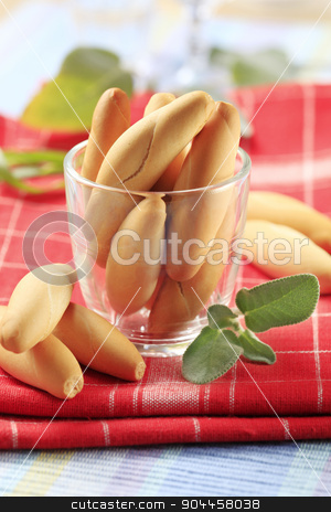 To use this stock image in your creative project, please select the size you need over to the right and click the "Add to Cart" button.
Your downloaded image will come with the Cutcaster watermark removed so don’t worry about the watermark you see on this page. Small white rolls stock photo, Small crispy white rolls in a glass by Digifoodstock