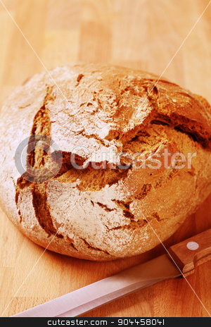 To use this stock image in your creative project, please select the size you need over to the right and click the "Add to Cart" button.
Your downloaded image will come with the Cutcaster watermark removed so don’t worry about the watermark you see on this page. Loaf of fresh bread stock photo, Loaf of fresh crusty bread - closeup by Digifoodstock