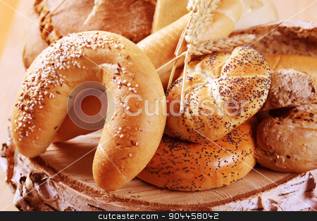 To use this stock image in your creative project, please select the size you need over to the right and click the "Add to Cart" button.
Your downloaded image will come with the Cutcaster watermark removed so don’t worry about the watermark you see on this page. Variety of fresh bread stock photo, Various types of fresh bread - detail by Digifoodstock