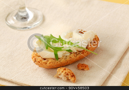 To use this stock image in your creative project, please select the size you need over to the right and click the "Add to Cart" button.
Your downloaded image will come with the Cutcaster watermark removed so don’t worry about the watermark you see on this page. Crisp roll with cheese spread stock photo, Crispy roll and cheese spread - closeup by Digifoodstock
