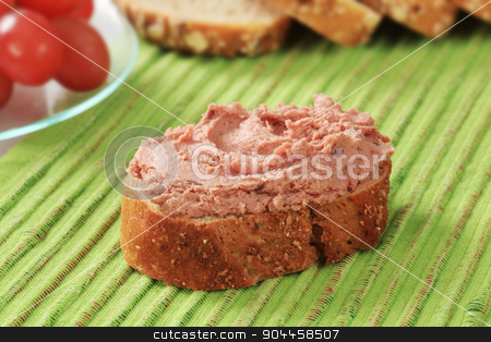 To use this stock image in your creative project, please select the size you need over to the right and click the "Add to Cart" button.
Your downloaded image will come with the Cutcaster watermark removed so don’t worry about the watermark you see on this page. Bread and pate stock photo, Slice of whole grain bread with pate by Digifoodstock