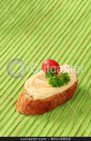 To use this stock image in your creative project, please select the size you need over to the right and click the "Add to Cart" button.
Your downloaded image will come with the Cutcaster watermark removed so don’t worry about the watermark you see on this page. Bread and cheese spread stock photo, Slice of bread roll and creamy cheese spread by Digifoodstock