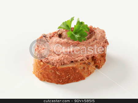 To use this stock image in your creative project, please select the size you need over to the right and click the "Add to Cart" button.
Your downloaded image will come with the Cutcaster watermark removed so don’t worry about the watermark you see on this page. Pate canape stock photo, Slice of whole grain bread roll spread with pate by Digifoodstock