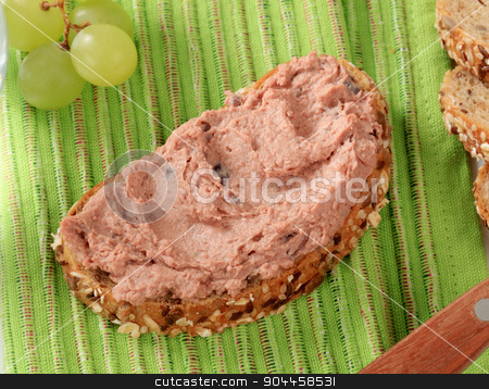 To use this stock image in your creative project, please select the size you need over to the right and click the "Add to Cart" button.
Your downloaded image will come with the Cutcaster watermark removed so don’t worry about the watermark you see on this page. Whole grain bread with pate stock photo, Slice of whole grain bread with pate by Digifoodstock
