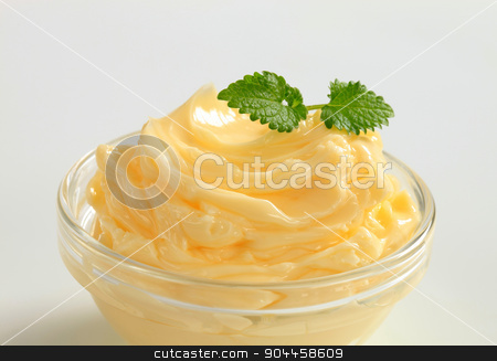 To use this stock image in your creative project, please select the size you need over to the right and click the "Add to Cart" button.
Your downloaded image will come with the Cutcaster watermark removed so don’t worry about the watermark you see on this page. Bowl of butter stock photo, Bowl of fresh butter -studio shot by Digifoodstock