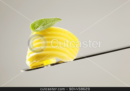 To use this stock image in your creative project, please select the size you need over to the right and click the "Add to Cart" button.
Your downloaded image will come with the Cutcaster watermark removed so don’t worry about the watermark you see on this page. Butter curl on a knife stock photo, Curl of fresh butter on a knife by Digifoodstock