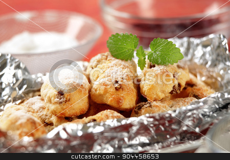 To use this stock image in your creative project, please select the size you need over to the right and click the "Add to Cart" button.
Your downloaded image will come with the Cutcaster watermark removed so don’t worry about the watermark you see on this page. Mini Christmas stollen stock photo, Mini Christmas stollen cakes in aluminum foil by Digifoodstock