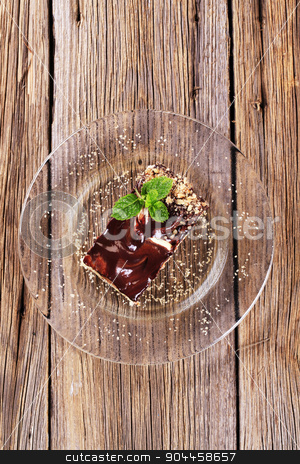 To use this stock image in your creative project, please select the size you need over to the right and click the "Add to Cart" button.
Your downloaded image will come with the Cutcaster watermark removed so don’t worry about the watermark you see on this page. Vanilla cream cake stock photo, Slice of vanilla cream cake with chocolate icing by Digifoodstock