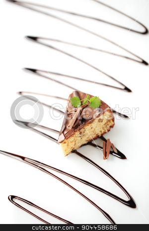 To use this stock image in your creative project, please select the size you need over to the right and click the "Add to Cart" button.
Your downloaded image will come with the Cutcaster watermark removed so don’t worry about the watermark you see on this page. Chocolate glazed cake stock photo, Delicious nut cake glazed with chocolate icing by Digifoodstock