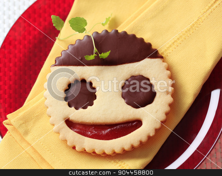 To use this stock image in your creative project, please select the size you need over to the right and click the "Add to Cart" button.
Your downloaded image will come with the Cutcaster watermark removed so don’t worry about the watermark you see on this page. Chocolate dipped jam biscuit stock photo, Chocolate dipped jam biscuit on yellow napkin by Digifoodstock