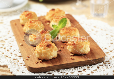 To use this stock image in your creative project, please select the size you need over to the right and click the "Add to Cart" button.
Your downloaded image will come with the Cutcaster watermark removed so don’t worry about the watermark you see on this page. Coconut macaroons stock photo, Coconut macaroons sprinkled with chopped nuts by Digifoodstock