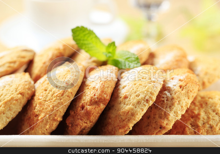 To use this stock image in your creative project, please select the size you need over to the right and click the "Add to Cart" button.
Your downloaded image will come with the Cutcaster watermark removed so don’t worry about the watermark you see on this page. Crispy cookies stock photo, Rows of crispy cookies in styrofoam container by Digifoodstock