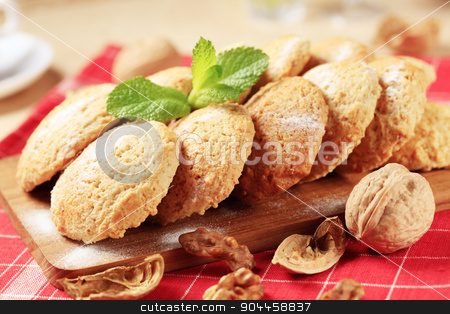 To use this stock image in your creative project, please select the size you need over to the right and click the "Add to Cart" button.
Your downloaded image will come with the Cutcaster watermark removed so don’t worry about the watermark you see on this page. Crispy cookies stock photo, Crispy cookies on a cutting board - closeup by Digifoodstock