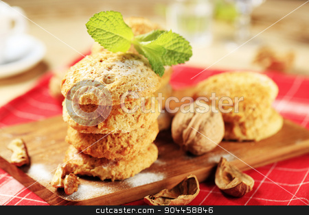 To use this stock image in your creative project, please select the size you need over to the right and click the "Add to Cart" button.
Your downloaded image will come with the Cutcaster watermark removed so don’t worry about the watermark you see on this page. Crispy cookies stock photo, Crispy cookies on a cutting board - closeup by Digifoodstock